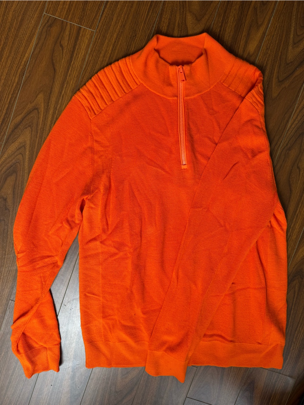 RLX Ralph Lauren performance full-zip sweater in a bold orange color